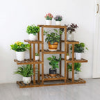 9-tier pine plant stand with plants indoors on white background
